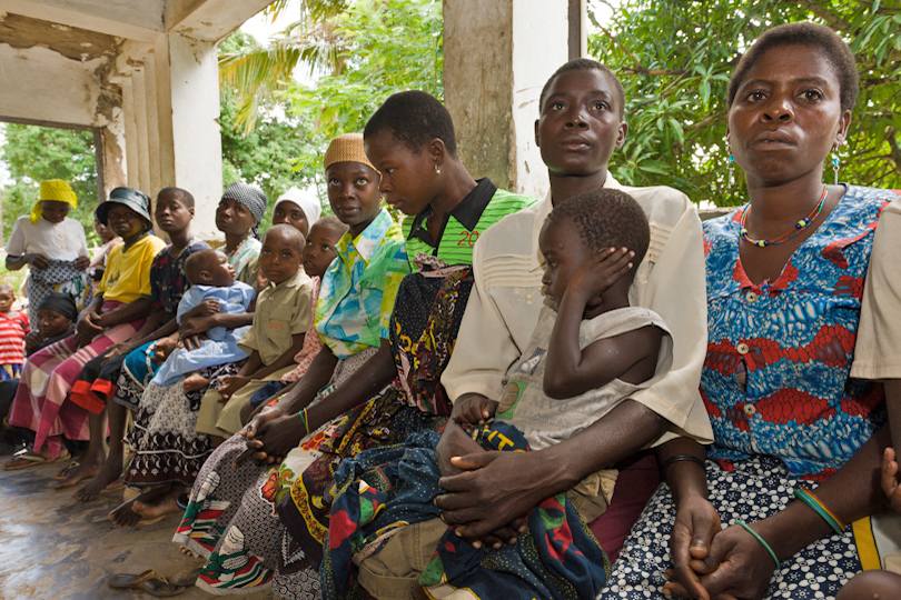 HIV/AIDS clinic mothers with children waiting&lt;p&gt; outside a dispensary